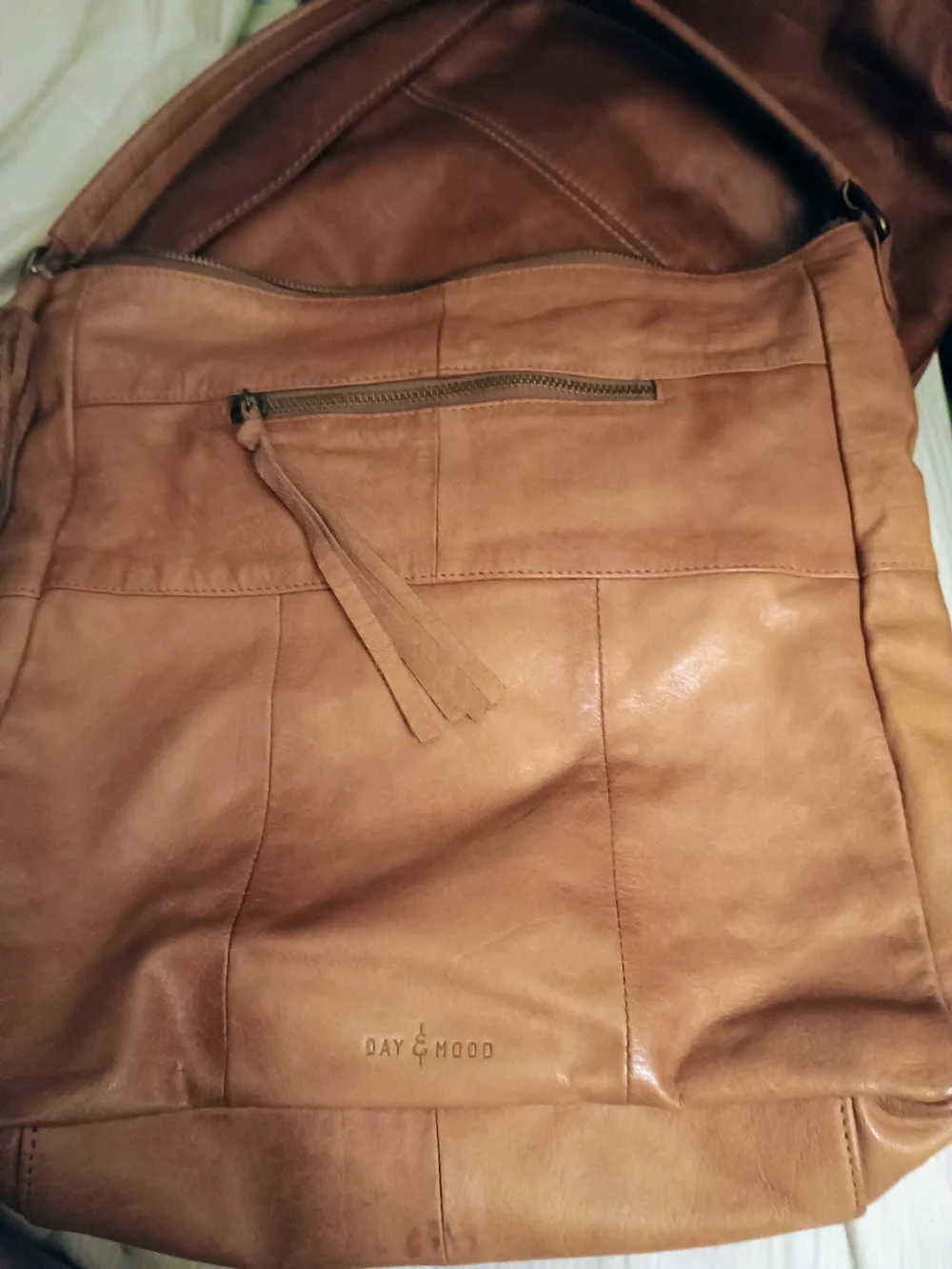 ANTHROPOLOGIE!! LEATHER TAN W/TASSELS!! 14 IN X 14 IN